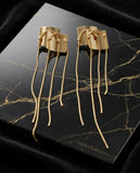 "The Gilded Cascade Tassels"