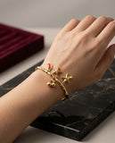"Bamboo Style Gold-Plated Charm Bangle",