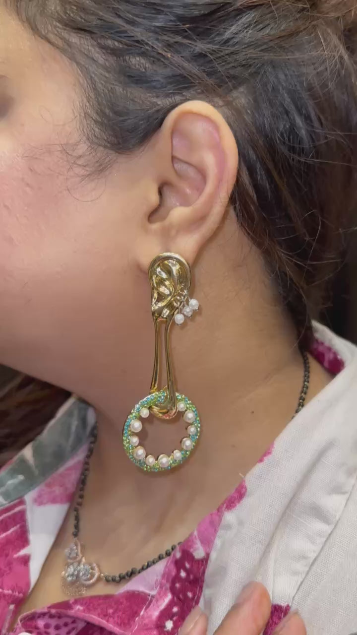The Ear of the Muse Asymmetric Drops